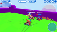 Several Smash Karts players battling together on the grass beside the track